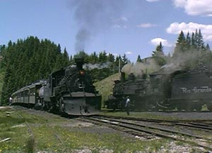 487 leaves Cumbres, whistling for the highway crossing. June 2000.
