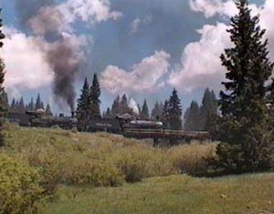 487 and 488 crossing old highway trestle at Cumbres, June 1997